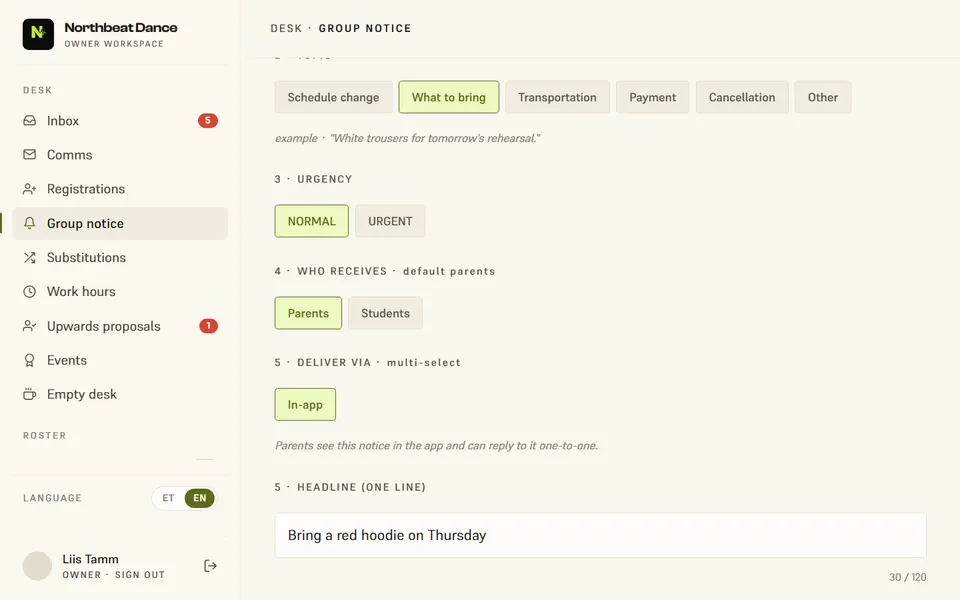 Studio manager desk: writing a group notice to bring a red hoodie on Thursday